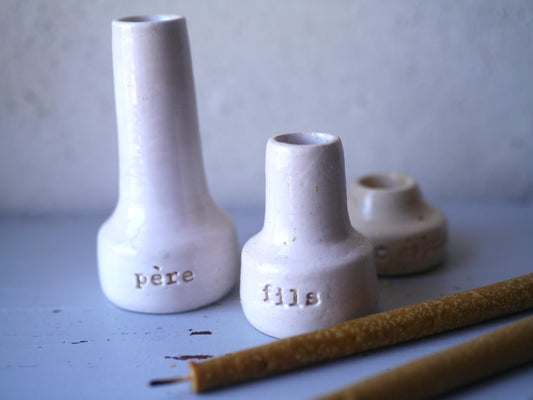 TRIO OF SACRED CANDLE HOLDERS, engraved with "father", "son", "holy spirit".
